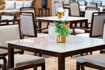 Tables and chairs in the restaurant