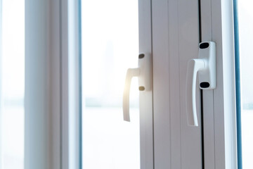 Close up of window with handles
