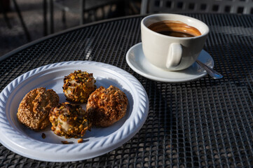 Sweet cookies with nuts and an espresso, Monreale, Italy