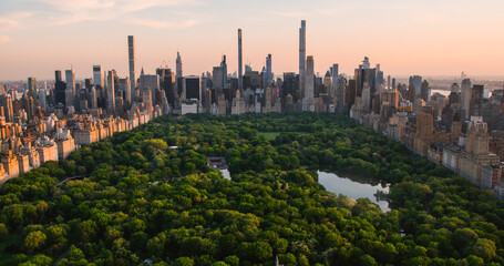 Aerial Helicopter Photo Over Central Park with Nature, Trees, People Having Picnic and Resting on a...