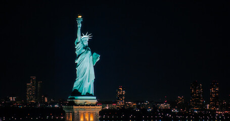 Panoramic Aerial Image of an American Symbol of Freedom. Cinematic Helicopter Pass by the Statue of...