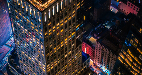 High Angle Aerial Helicopter Photo Over Midtown Manhattan Skyscrapers Cityscape with Lights from...