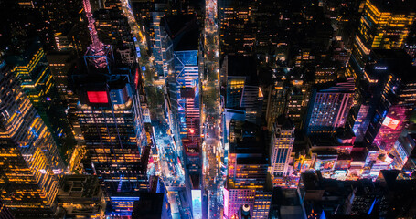 New York Concrete Jungle at Night. Aerial Photo from a Helicopter Tour Around Manhattan. Scenes...