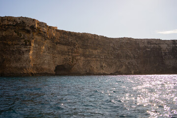 Fototapeta na wymiar Cliff with cave from Comino island Malta