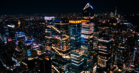Aerial View of Midtown Manhattan Architecture at Night. Evening Shot of Financial Business District...