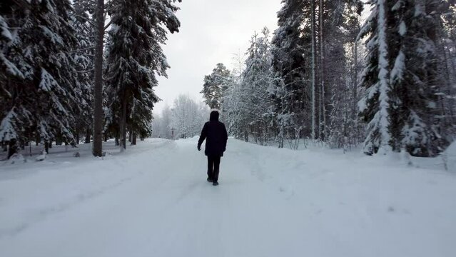 Man on snow road