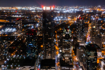 Helicopter Tour of New York City Architecture at Night. Midtown Manhattan Office Buildings and...