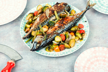 Mackerel fish baked with vegetables.