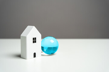 House and blue globe. Internet access concept. Digitally connected home, offering a global gateway...