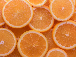 oranges cut into slices and laid out on the table as a food background 4