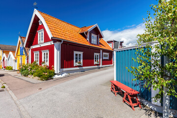 Scandinavian style houses in colored wood in Karlskrona Sweden - obrazy, fototapety, plakaty