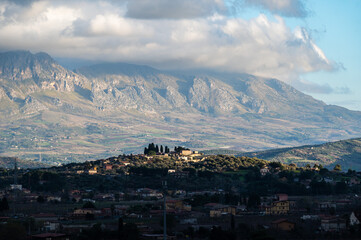 Remote village houes, a green valley and the mount Pellegrino , Gibilrossa, Sicily, Palermo