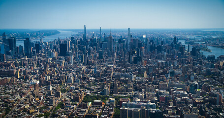 Scenic Aerial New York City View Towards Lower Manhattan Architecture. Panoramic Photo of Midtown Financial District from a Helicopter. Cityscape with Office Buildings and Skyscrapers