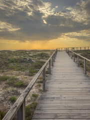 A wood pedestrian walkways, build over a sand dune that is used to give beach access in Furadouro...