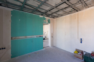 Construction worker installation ceiling work