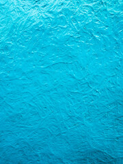 Blue painted wall surface for smooth wooden house interior close-up. blue background abstract wall texture