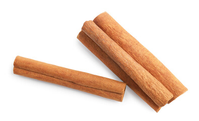 Pile of aromatic cinnamon sticks isolated on white, top view