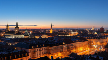 Fototapeta na wymiar A historic European cityscape seen from a rooftop at dusk.