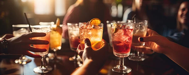 Foto op Plexiglas People hold cocktails in hands. Fruit drink in glasses. © Milan