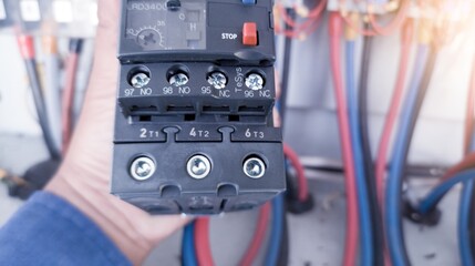 Replacement of the magnetic contactor set in the machine control panel, the concept of repairing electrical controls on machines by replacing parts.