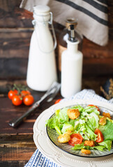 Healthy Grilled Chicken Caesar Salad with Cheese and Croutons © Dasha Petrenko