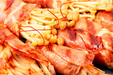 Enoki mushroom appetizer fried in bacon