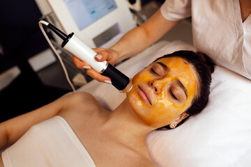 Woman during the oxygen mesotherapy procedure at the beauty salon
