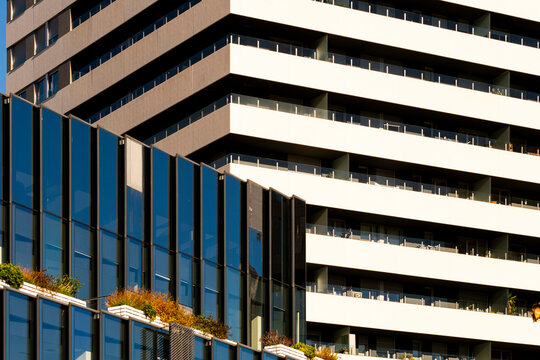 Facade of modern apartment buildings in Barcelona in Spain