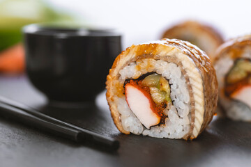 Sushi roll with rice, crab, cucumber. Sushi menu. Japanese food.