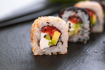 Sushi roll with rice. Sushi menu. Japanese food.
