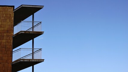 building balconies against blue sky