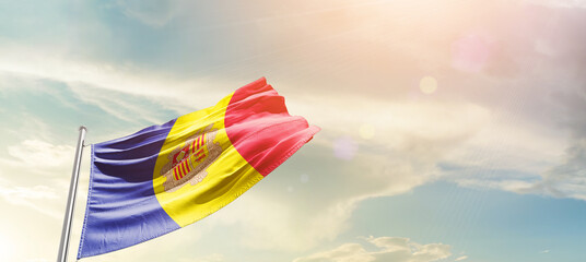 Andorra national flag cloth fabric waving on the sky - Image