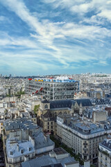 Paris, aerial view of the city, with the Pompidou center, and the Defense in background
