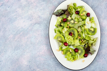 Kiwi salad in a plate