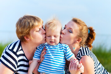 Happy family having fun at the beach