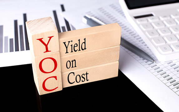 Word YOC made with wood building blocks, business concept