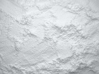 White flour texture background. Abstract powder texture. White powder surface with cracks.