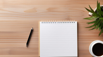 white blank notepad is on top of wood office desk table