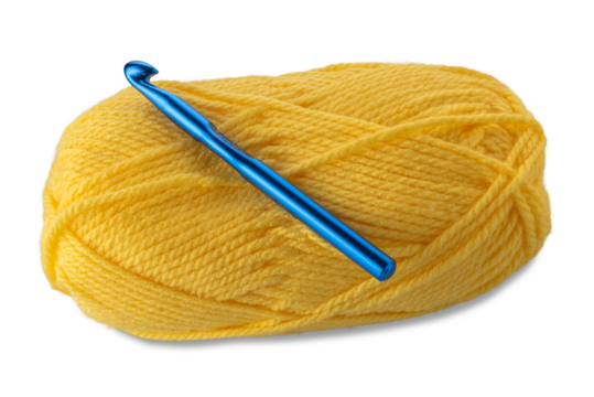 Ball of yellow-colored wool yarn with knitting weaving crochet hook 10 mm blue color isolated