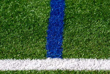 Line marking on an artificial football field
