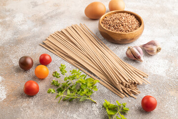 Japanese buckwheat soba noodles on brown concrete. Side view.