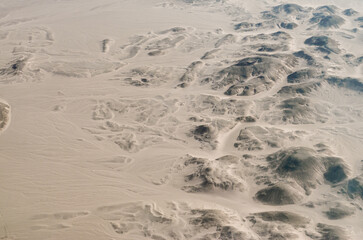 view from the plane window of the desert in Egypt