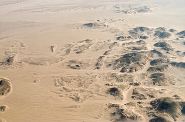 view from the plane window of the desert in Egypt