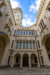 The inner courtyard Castle Hluboka. Beautiful Gothic elements on the walls. Hluboka nad Vltavou. Czech Republic.