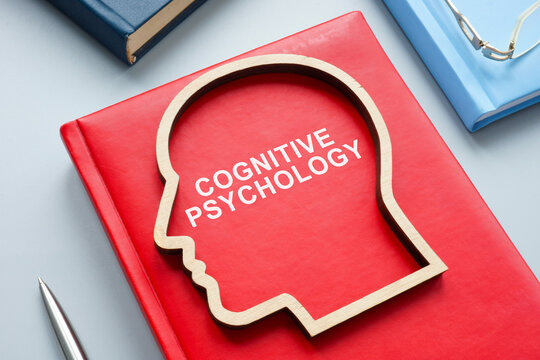 Table with a book about cognitive psychology.