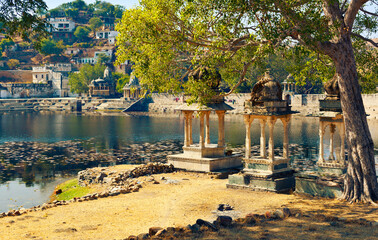 View of ancient ghats of small unknown lake not far from Hindu temple complex Eklingji. Kailashpuri...