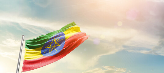 Ethiopia national flag cloth fabric waving on the sky - Image