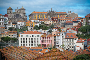 Fototapeta na wymiar Porto, Portugal old town promenade view with colourful houses, Douro river and boats