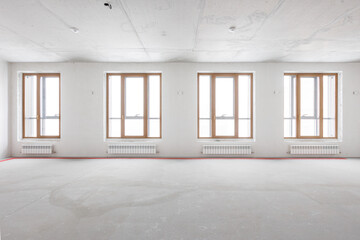 interior of the apartment without decoration in gray colors. rough finish