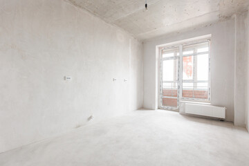 interior of the apartment without decoration in gray colors. rough finish